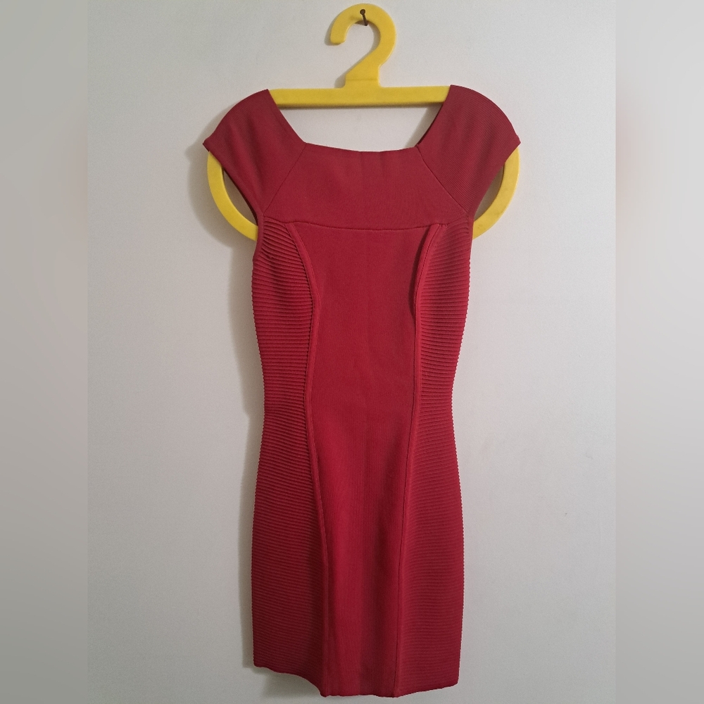 Bebe red dress. Form fitting with elastic kind of bandage but not as tight